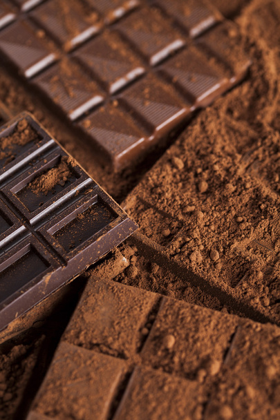 Chocolate bars with powder  - Fotoğraf, Görsel