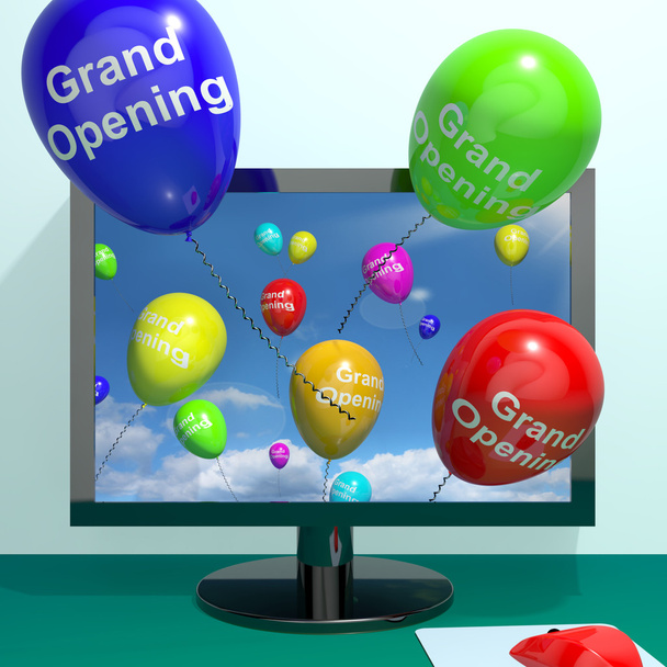 Εγκαίνια μπαλόνια από υπολογιστή που παρουσιάζει το νέο ηλεκτρονικό κατάστημα la - Φωτογραφία, εικόνα