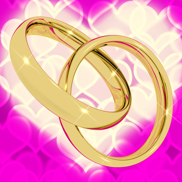 ピンクのハートの愛ベールを表す背景のボケ味に金の指輪 - 写真・画像