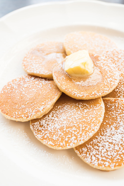 Pancake with butter on top - Foto, afbeelding