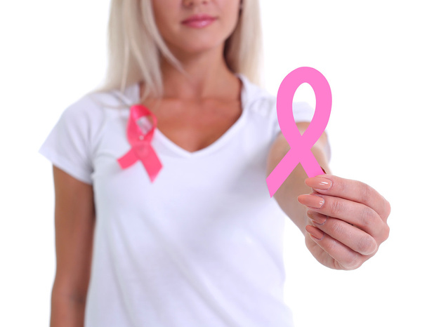 przytrzymanie wstążki świadomości raka piersi różowy ręka womans - Zdjęcie, obraz