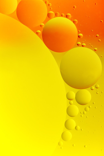 High contrast abstract of oil droplets. Vertically.  - 写真・画像