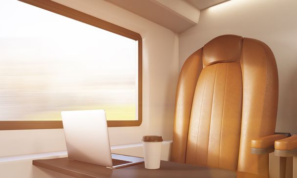 Brown armchair and laptop in compartment - Photo, Image