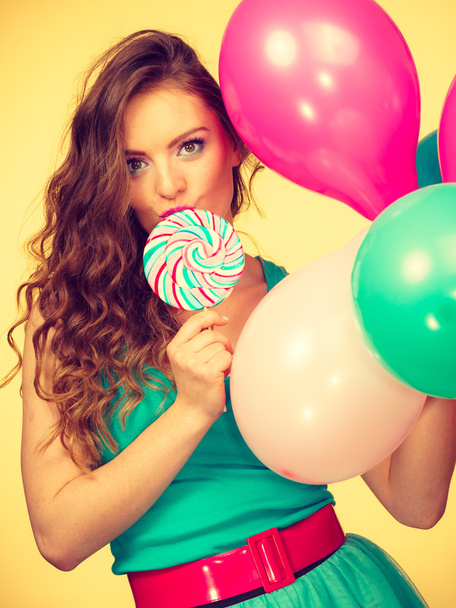 Woman with colorful balloons and lollipop - Fotoğraf, Görsel
