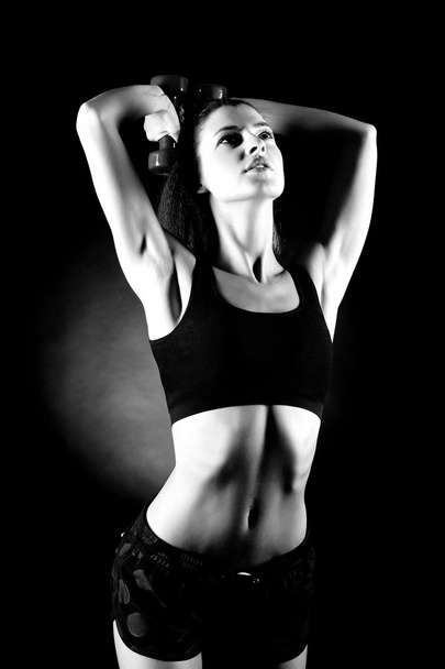 woman lifting dumbbells - Photo, image