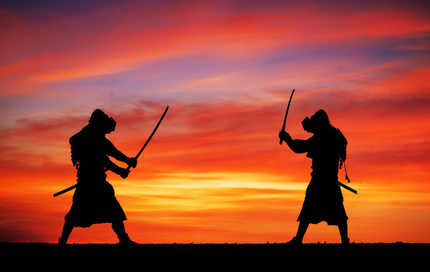 Silhouette of samurais in duel. Picture with two samurais and sunset - Photo, Image