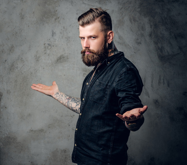 Bearded hipster male in a black shirt - Photo, image
