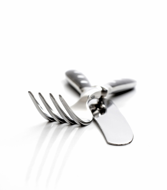Cubertería, tenedor con cuchillo aislado en blanco
 - Foto, imagen