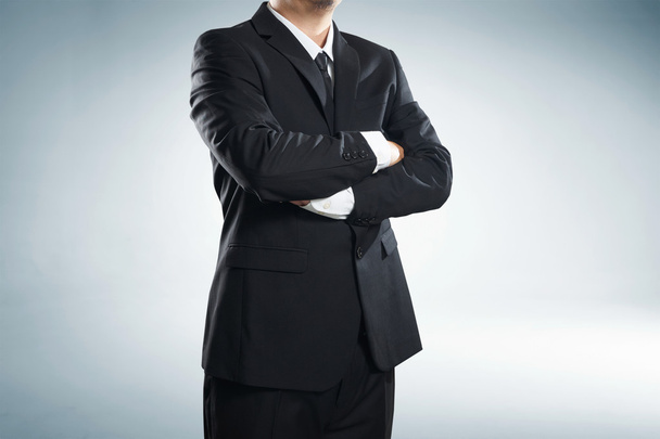 Businessman with side folded arms - Photo, image