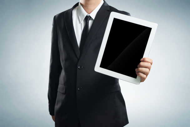 businessman holding tablet - Fotó, kép