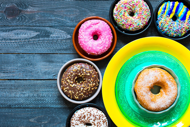 Colorful Donuts breakfast composition - Фото, зображення
