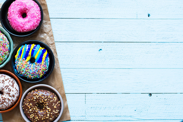 Colorful Donuts breakfast composition - Фото, зображення