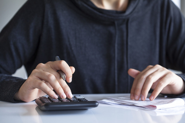 Woman hands with bills on table - Photo, Image