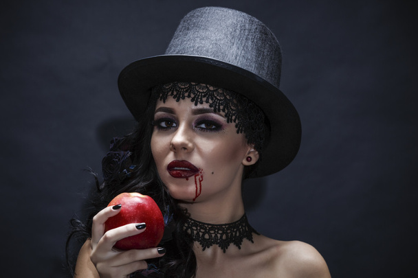 Halloween. Fashion portrait of witch or night vampire woman with - Photo, Image