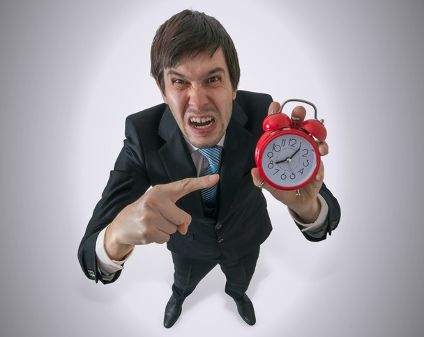 Дисципліна на концепції роботи. Ф'юрі і сердитий менеджер показує годинник
. - Фото, зображення