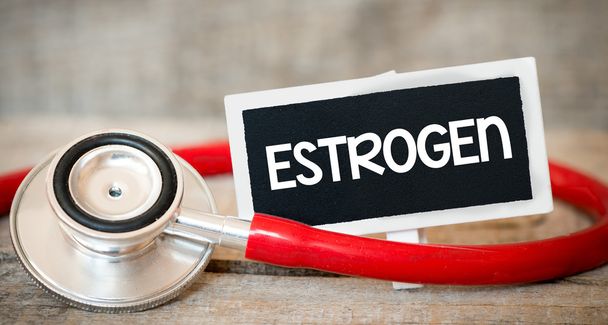Napis estrogenów przez stetoskop - Zdjęcie, obraz