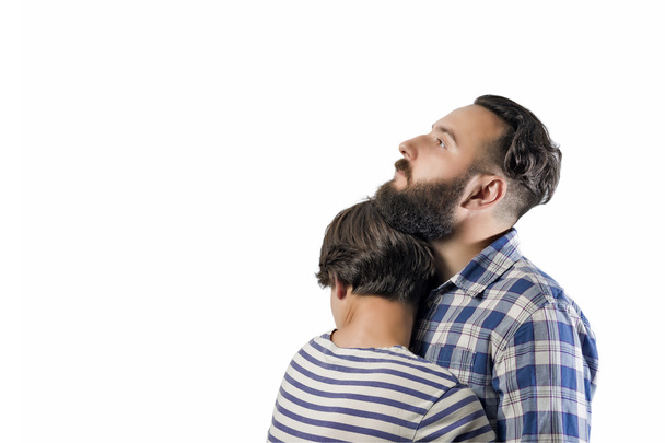 Embrace of bearded guy and girl  - Φωτογραφία, εικόνα