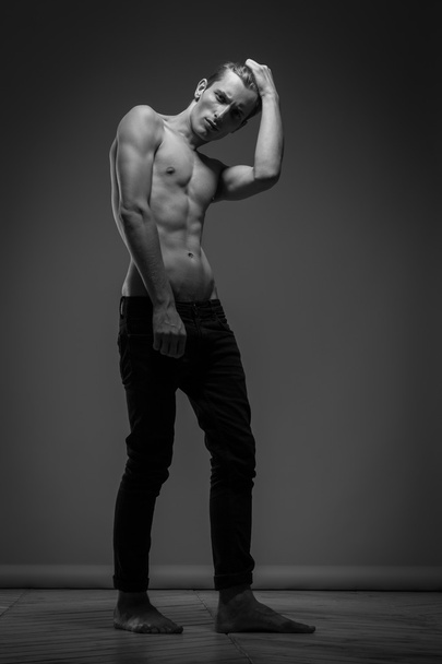 Handsome Man In Black Jeans - Fotó, kép