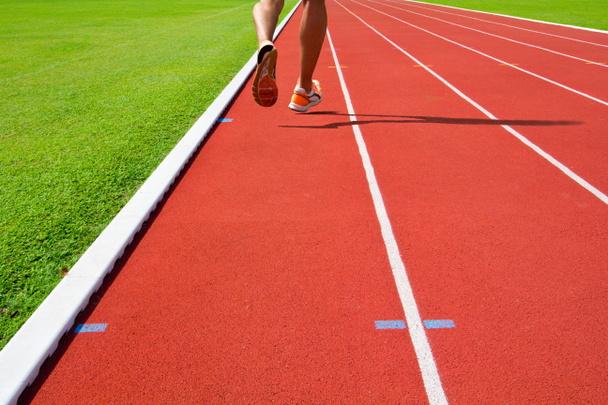 Athlete running in track - Photo, Image