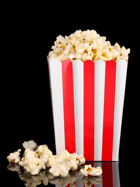 classic box of popcorn isolated on black - Фото, изображение