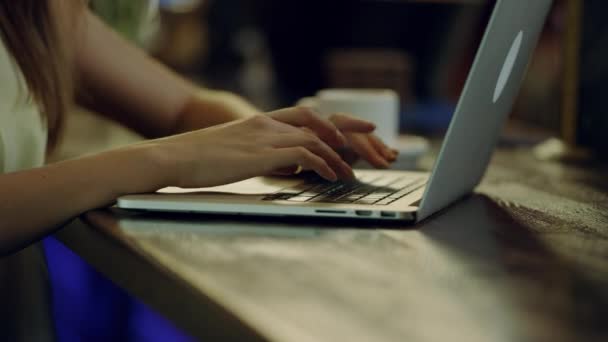 hands typing on a laptop - Кадри, відео