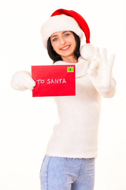 Aantrekkelijke vrouwen meisje met santa brief - Foto, afbeelding