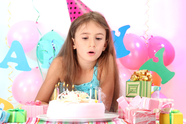 Little beautiful girl celebrate her birthday - 写真・画像