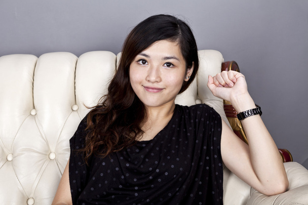 Asian woman relax on sofa - Photo, Image