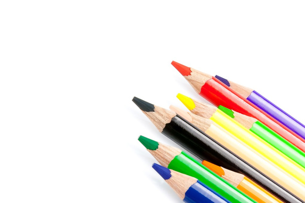 Colorful pencils in a corner on white background - Fotografie, Obrázek