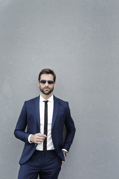 Handsome businessman in sunglasses  - Фото, зображення
