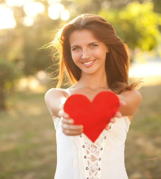 Woman with red heart - Photo, Image