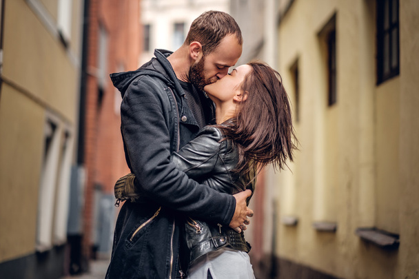 Male kissing cute brunette female - Photo, Image