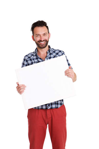 Щасливий зрілий чоловік тримає порожній рекламний щит
 - Фото, зображення