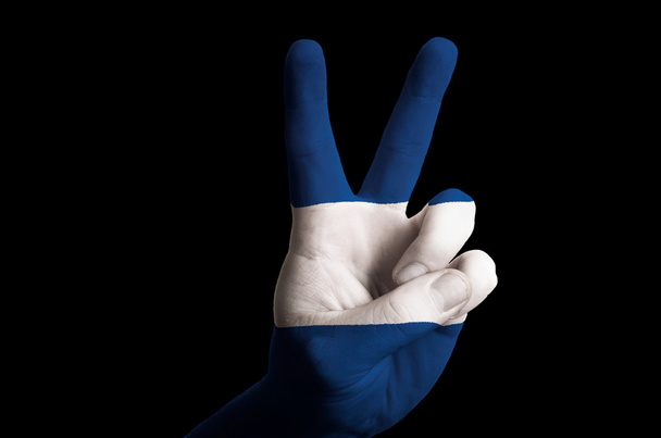 nicaragua national flag two finger up gesture for victory and wi - Foto, imagen