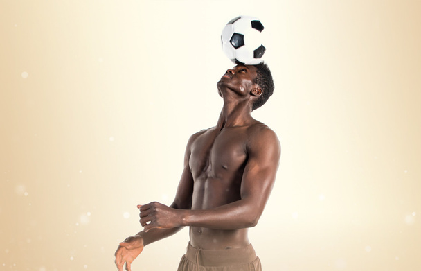 Black man playing football - Foto, Imagem