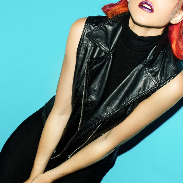 Model Rock style. Hairstyle trend and leather jacket - 写真・画像