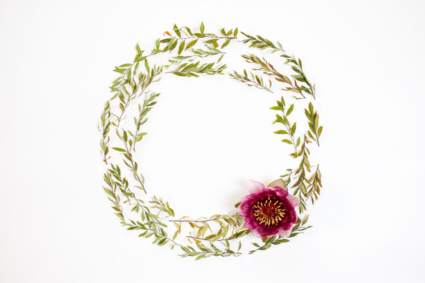 Floral round frame on white background. Flat lay, top view.  - Photo, Image