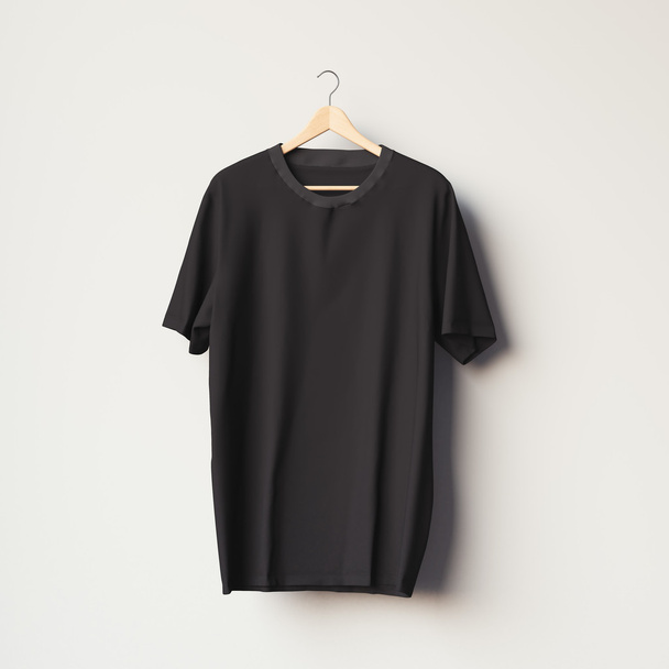 Black blank t-shirt on a wooden hanger. 3d rendering - Foto, imagen