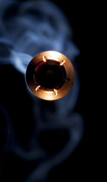 Hollow point bullet and smoke - Fotó, kép