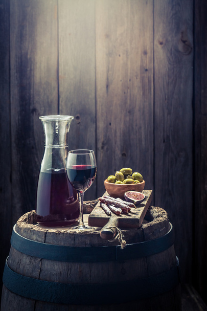 Red wine with olives and cold meats with copy space - Φωτογραφία, εικόνα