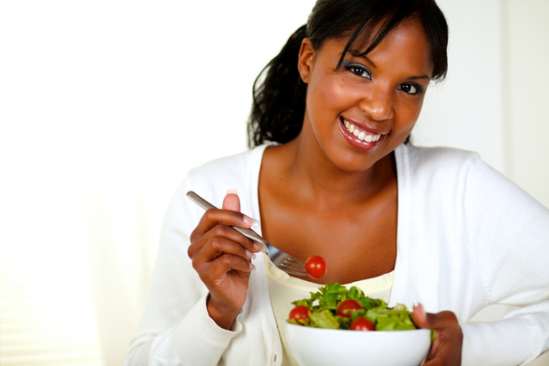 Woman eating fresh salad - Фото, изображение