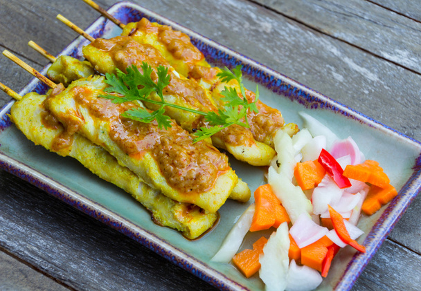 Chicken satay, Grilled chicken in turmeric and herb - Photo, Image