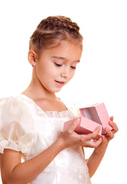Little girl and gift - Фото, зображення