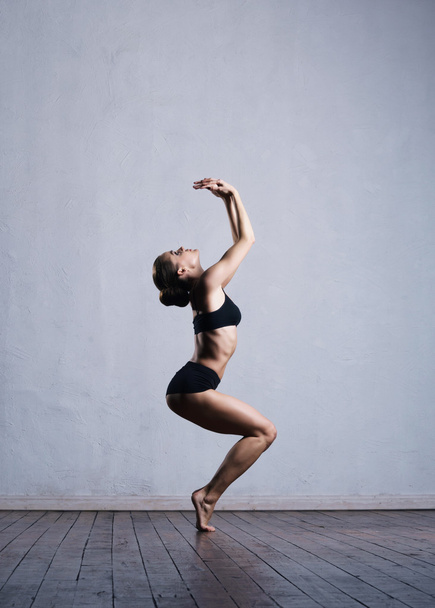 ballerina in black bra and panties - Фото, изображение