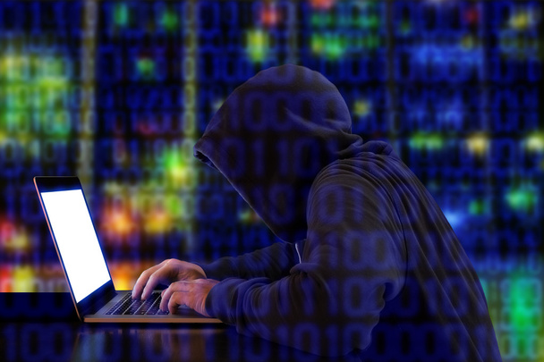 Hacker with notebook cybersecurity concept - Фото, изображение