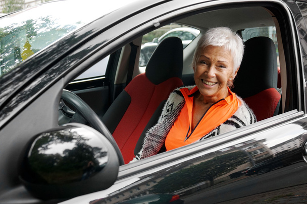 mature woman driver in her car - Photo, Image