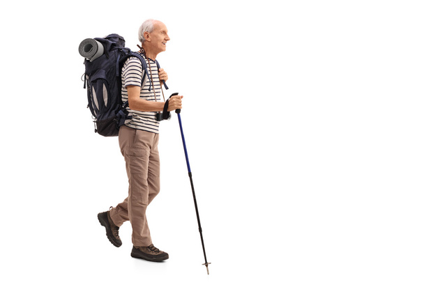Elderly male hiker walking - Photo, Image
