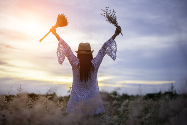 Woman in meadow. travel and sunset, soft and select focus - Fotoğraf, Görsel