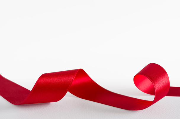 Red ribbon isolated on white background - Photo, image