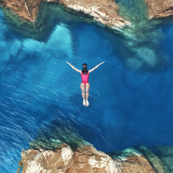 Woman jumping off cliff  - Photo, Image